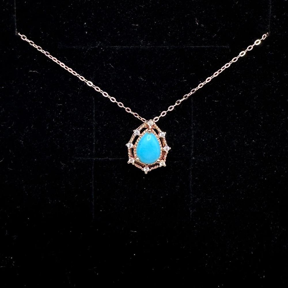 Natural sleeping beauty turqoise set in 18k rose gold over s925